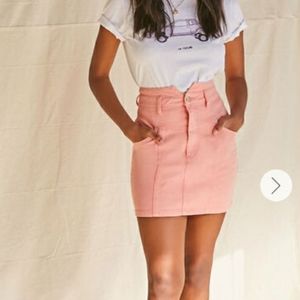 Notched pink denim mini skirt